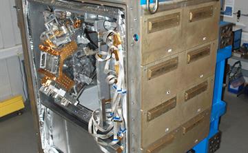 SCUBA2, which is alarge blue and metal astronomical instrument, in the Crawford Lab